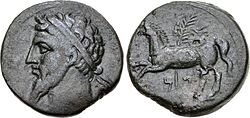 Ancient Numidian coin depicting King Massinissa with a horse on the reverse side.